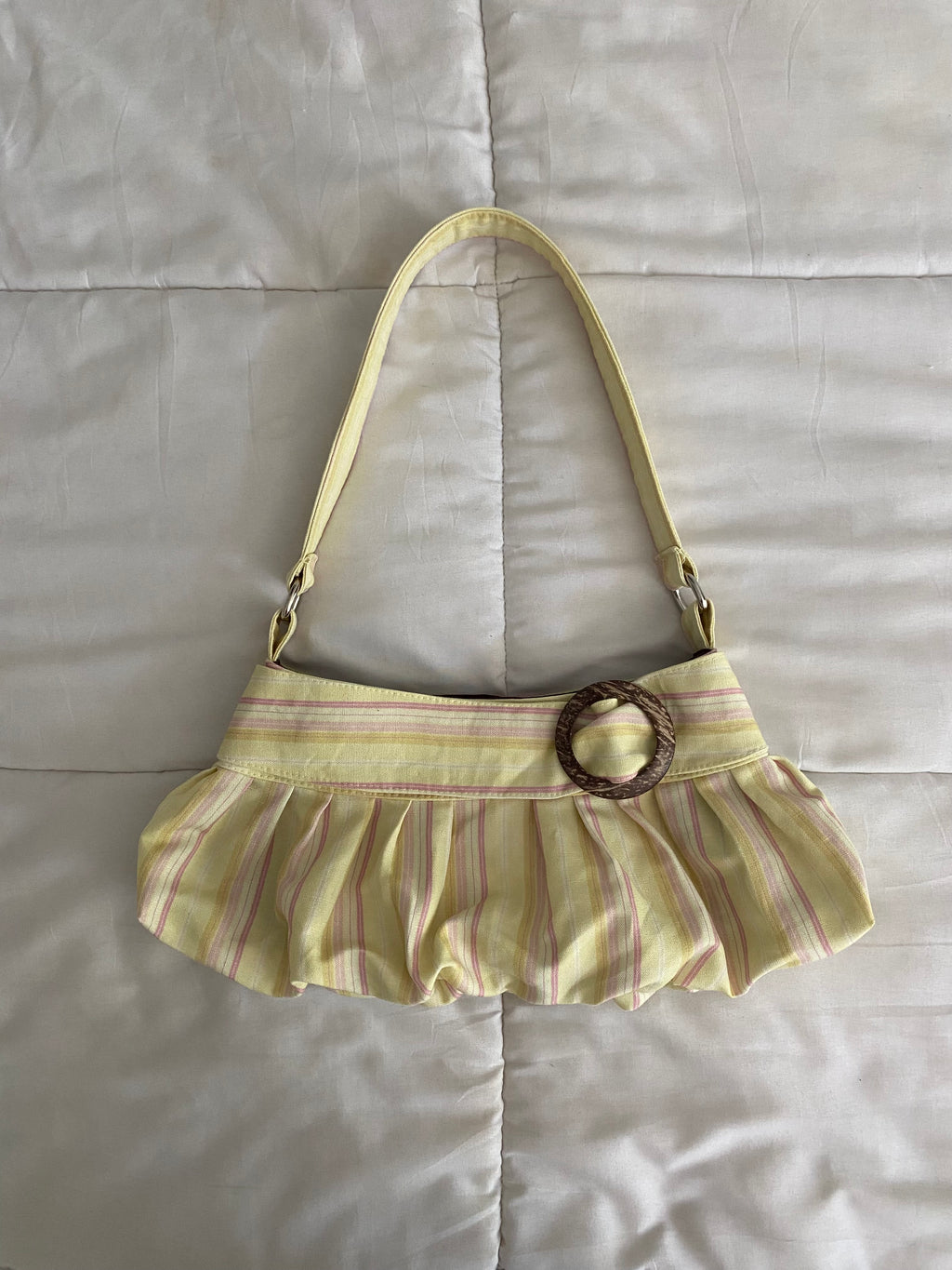 yellow & pink striped purse with buckle
