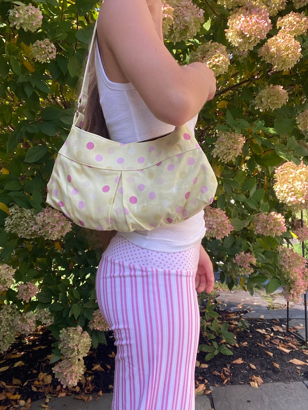 large polka dot purse in yellow