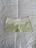green & cream silver button shorts