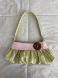 green & pink striped purse with button