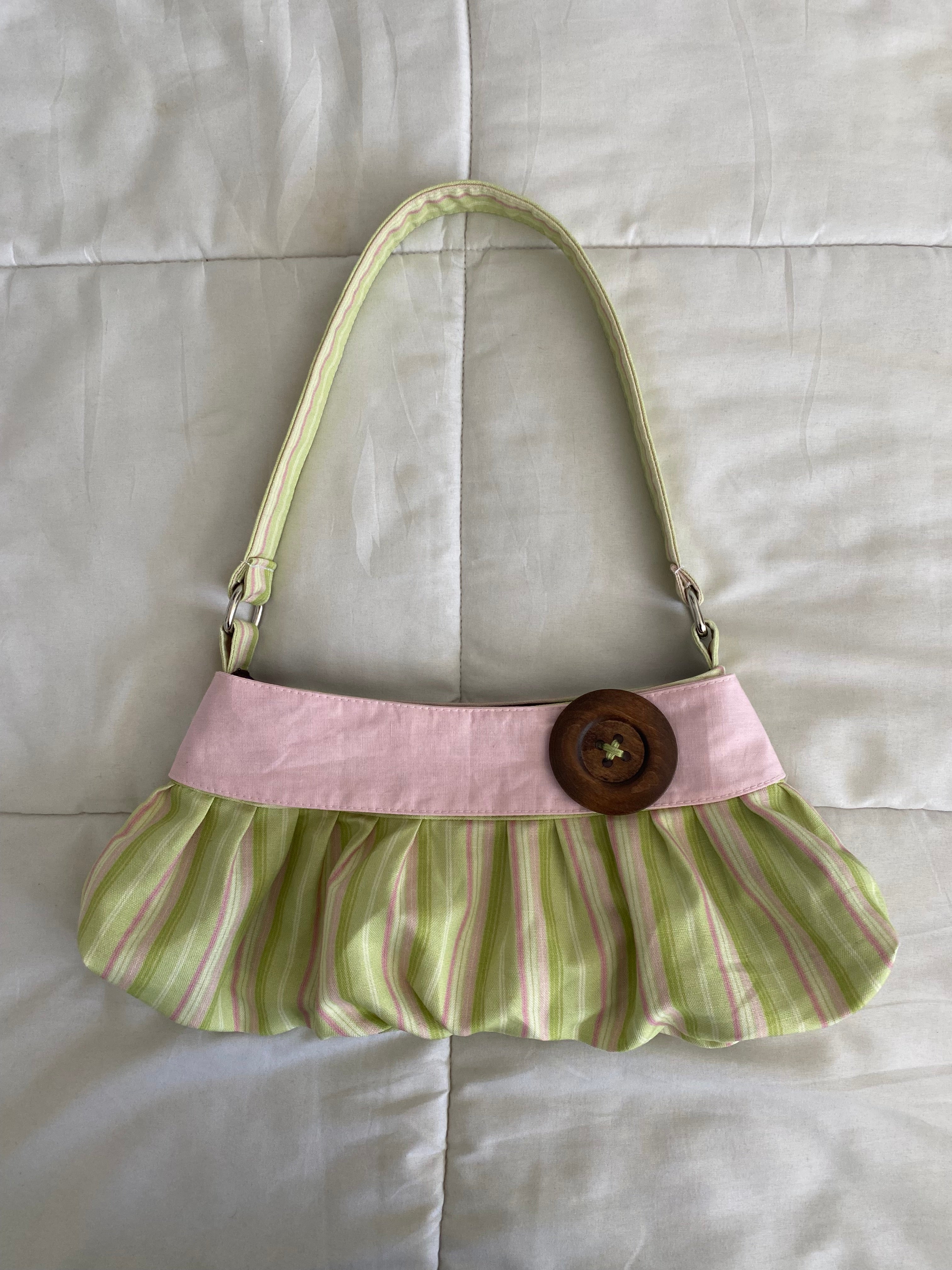 green & pink striped purse with button