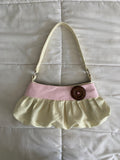 cream & pink polka dot purse with button