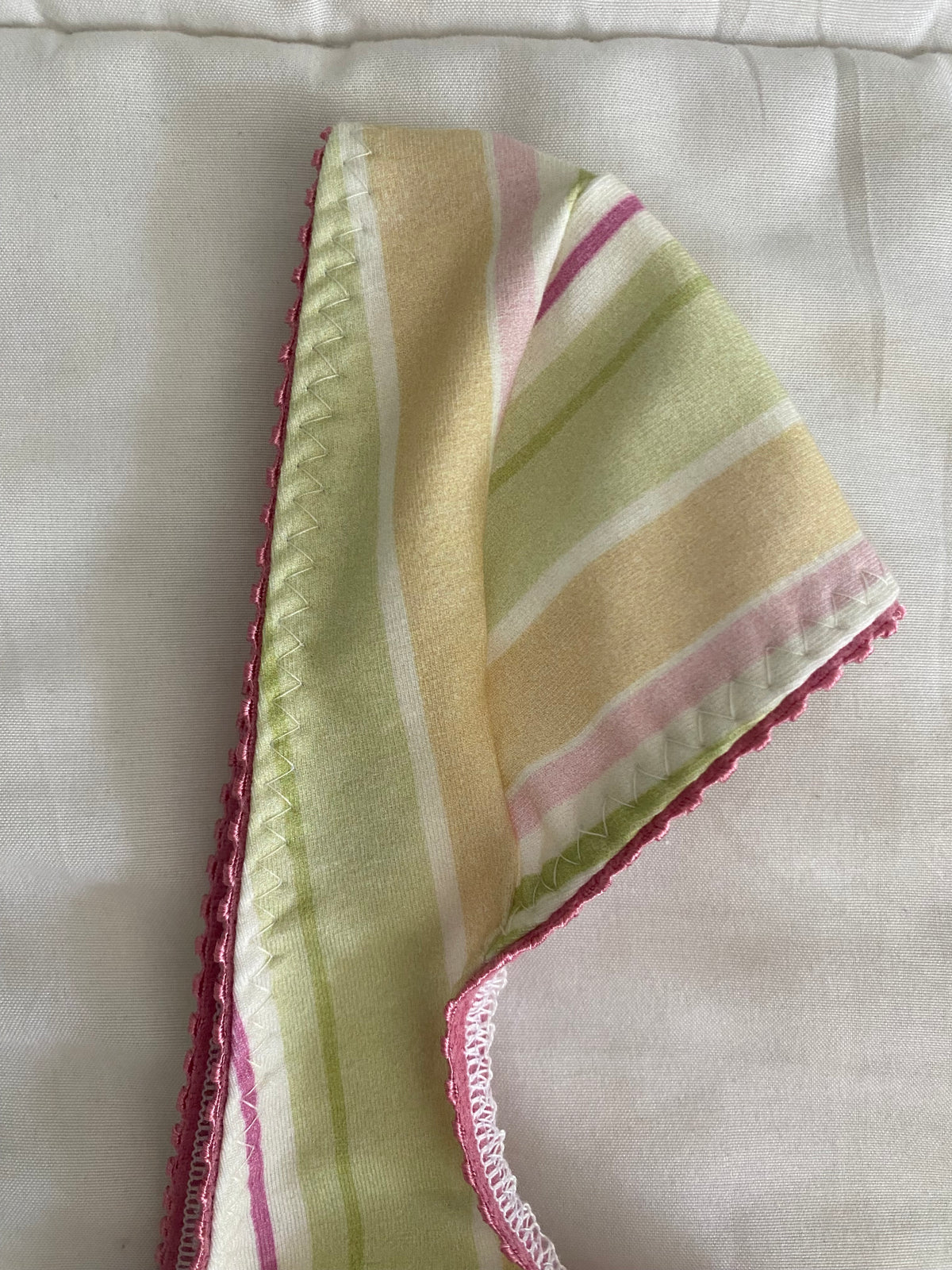 yellow/green/pink striped top