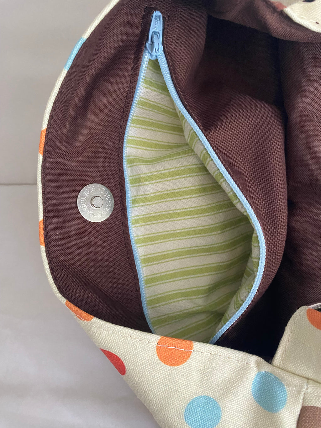 large polka dot multicolored purse