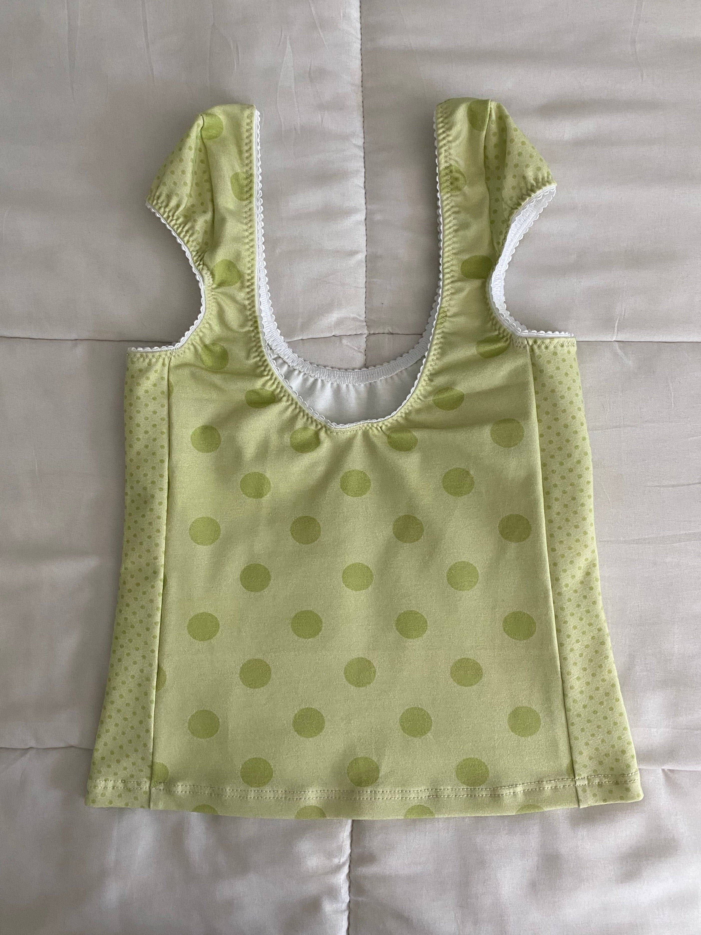 green polka dot top