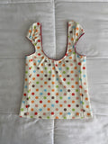 multicolored large polka dot top