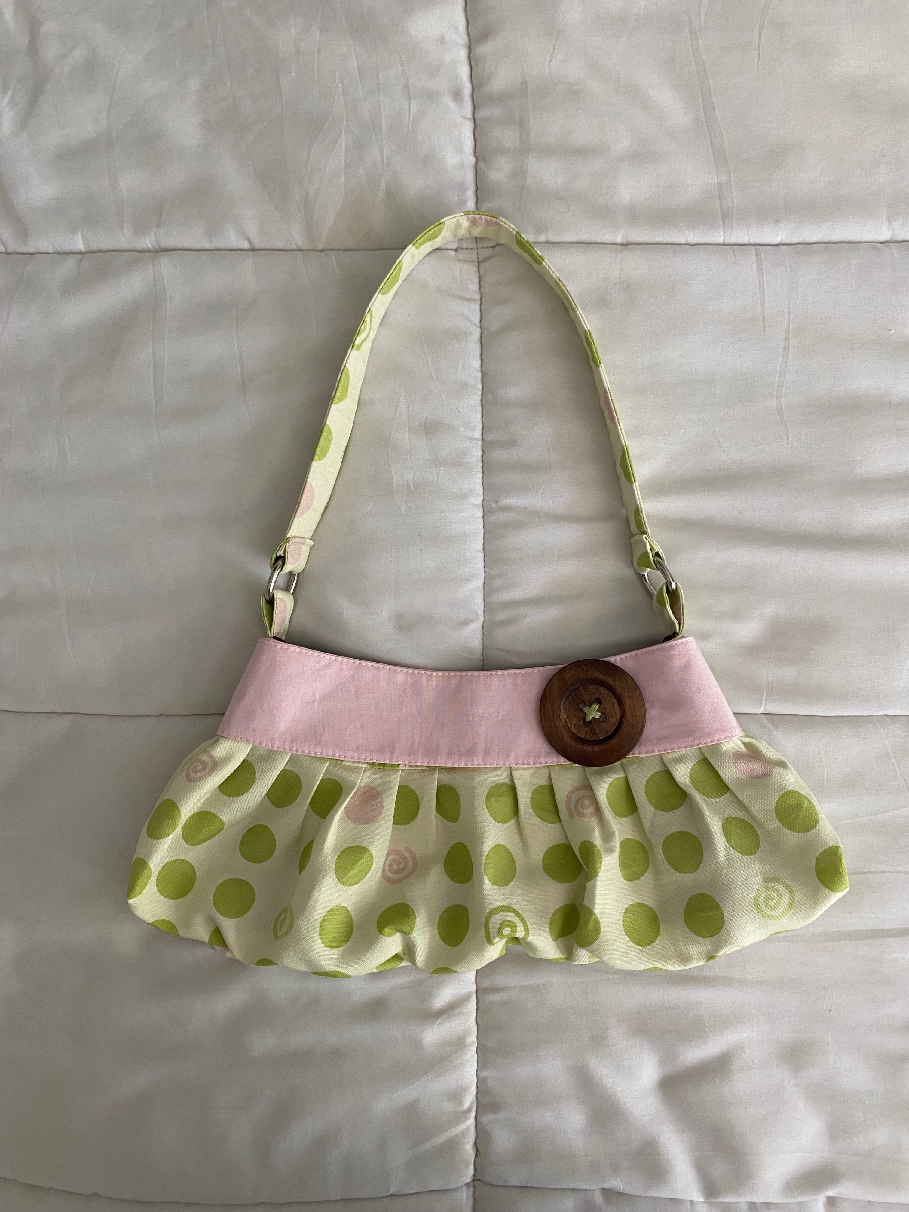 pink & green dotted/swirl purse with button