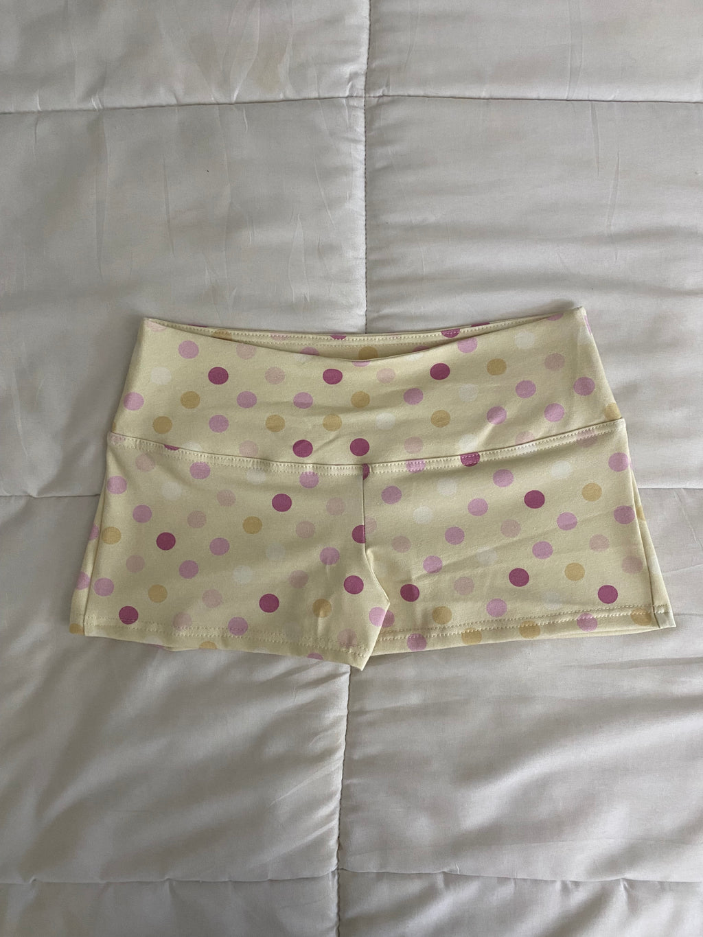 large polka dot shorts in yellow