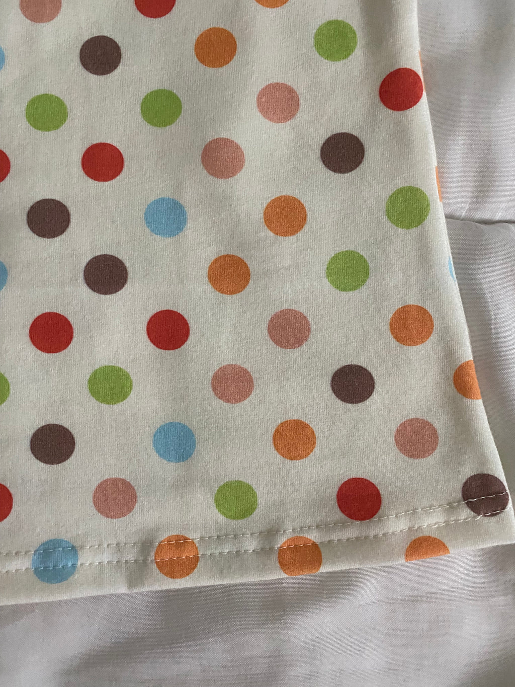 multicolored large polka dot long sleeve top