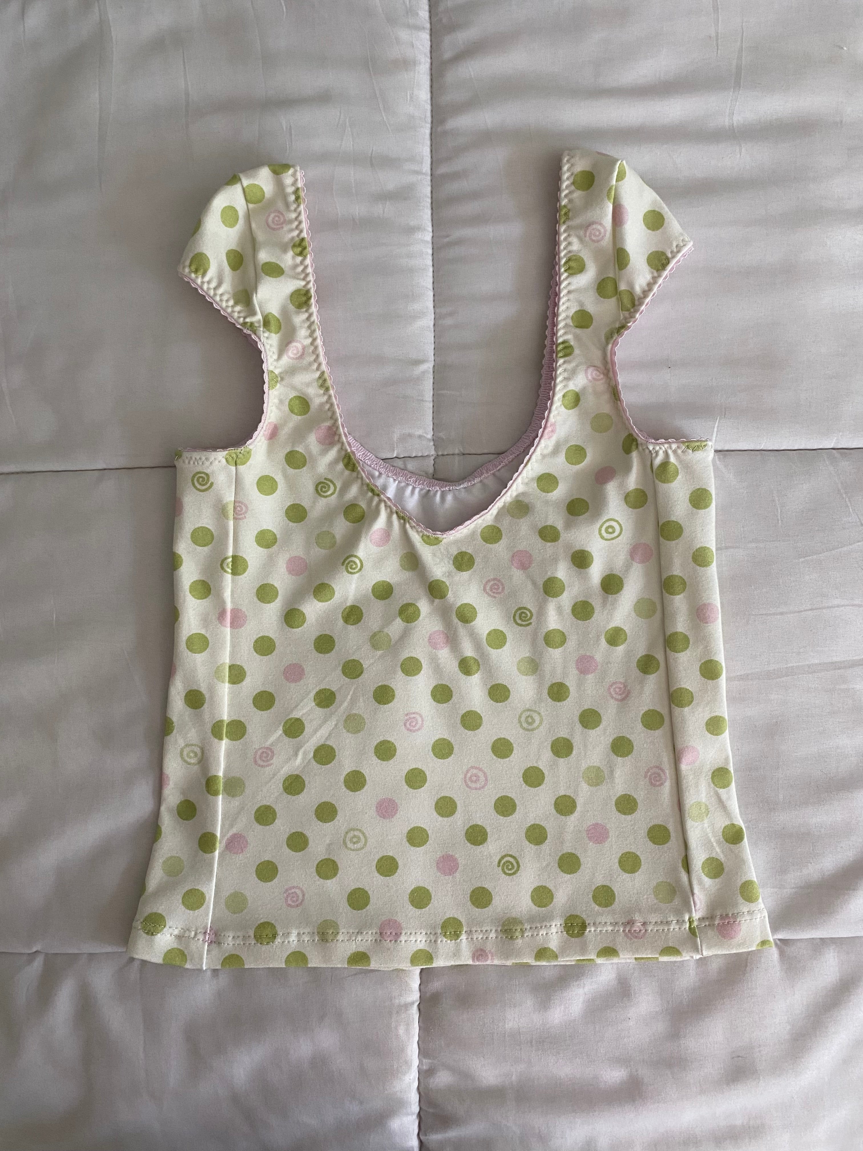 green & pink dotted/swirl top