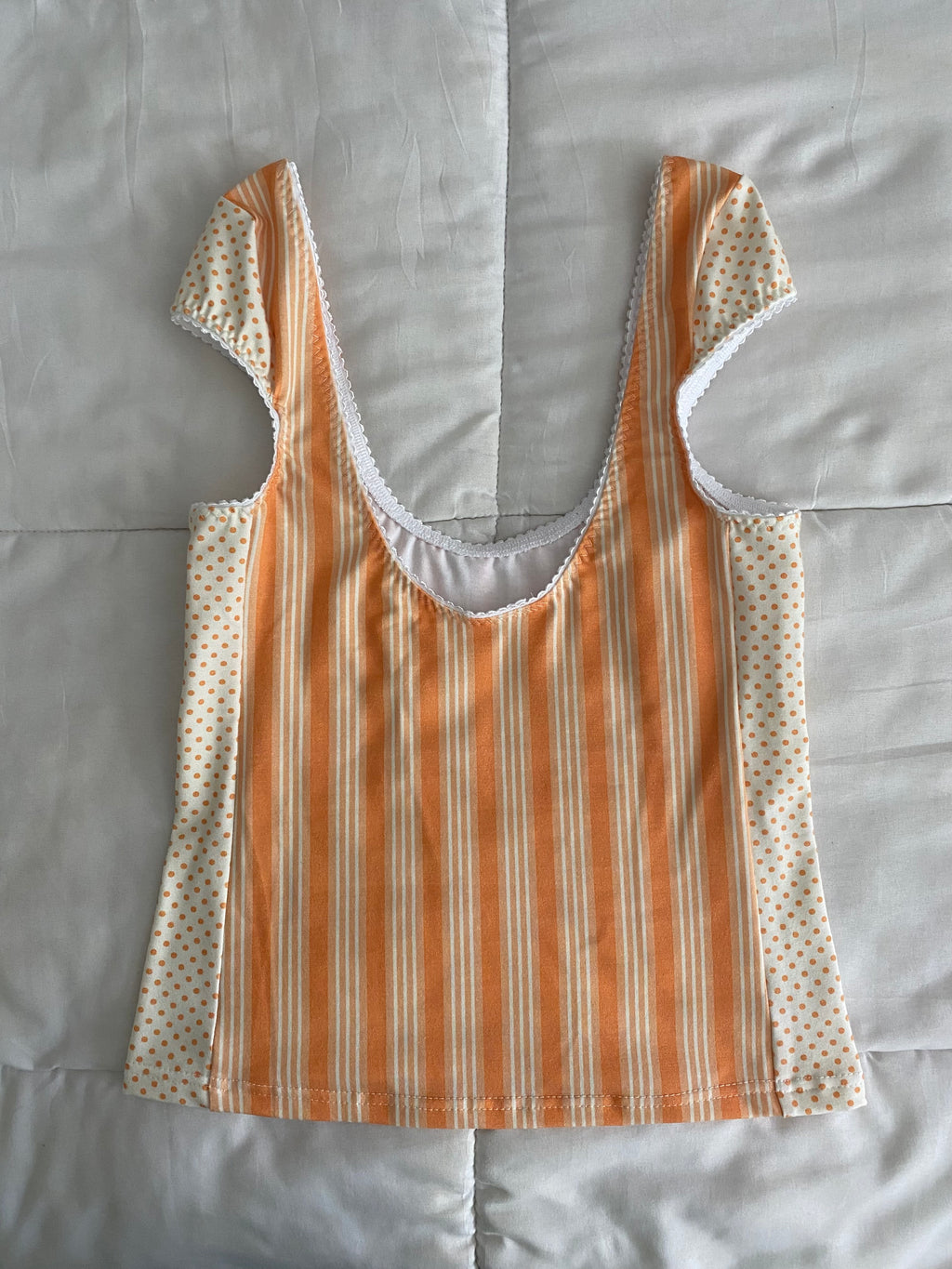 orange striped/polka dot top