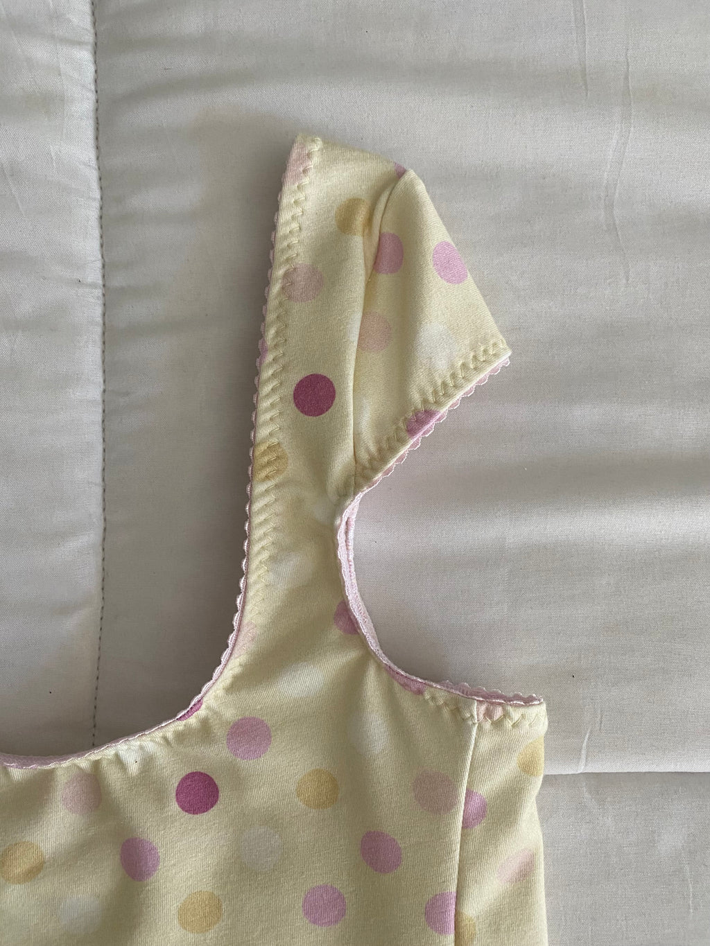 large polka dot top in yellow