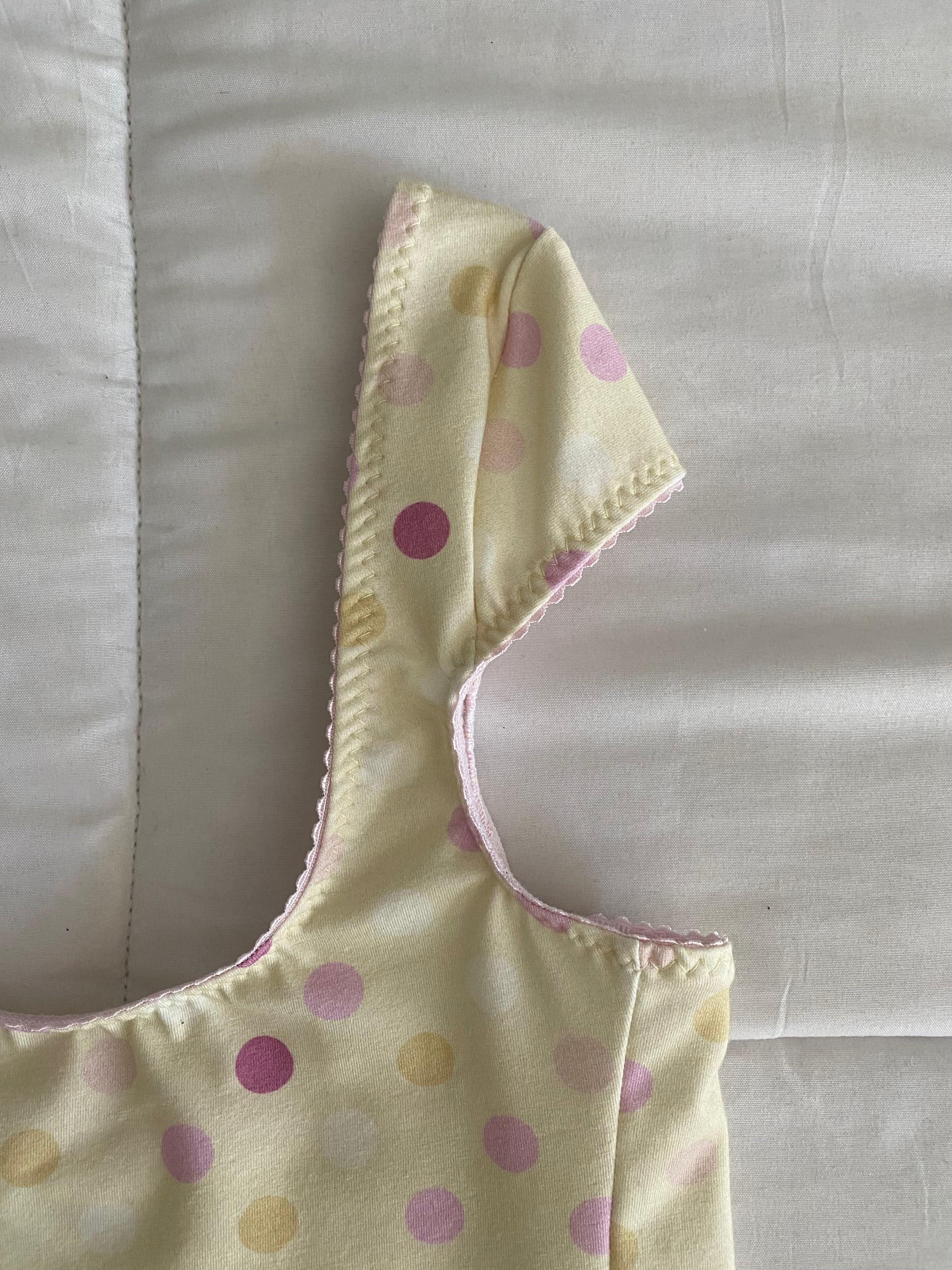 large polka dot top in yellow