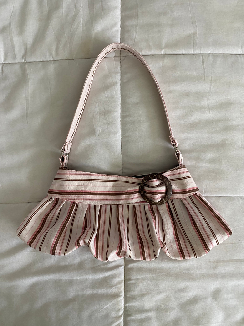 brown & pink striped purse with buckle