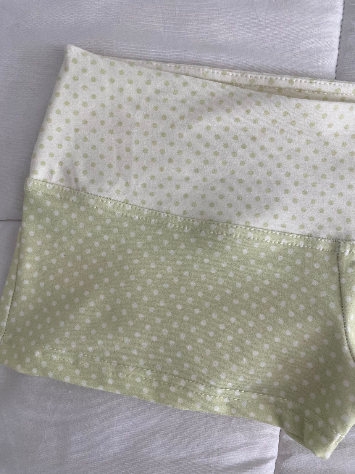 green & cream silver button shorts