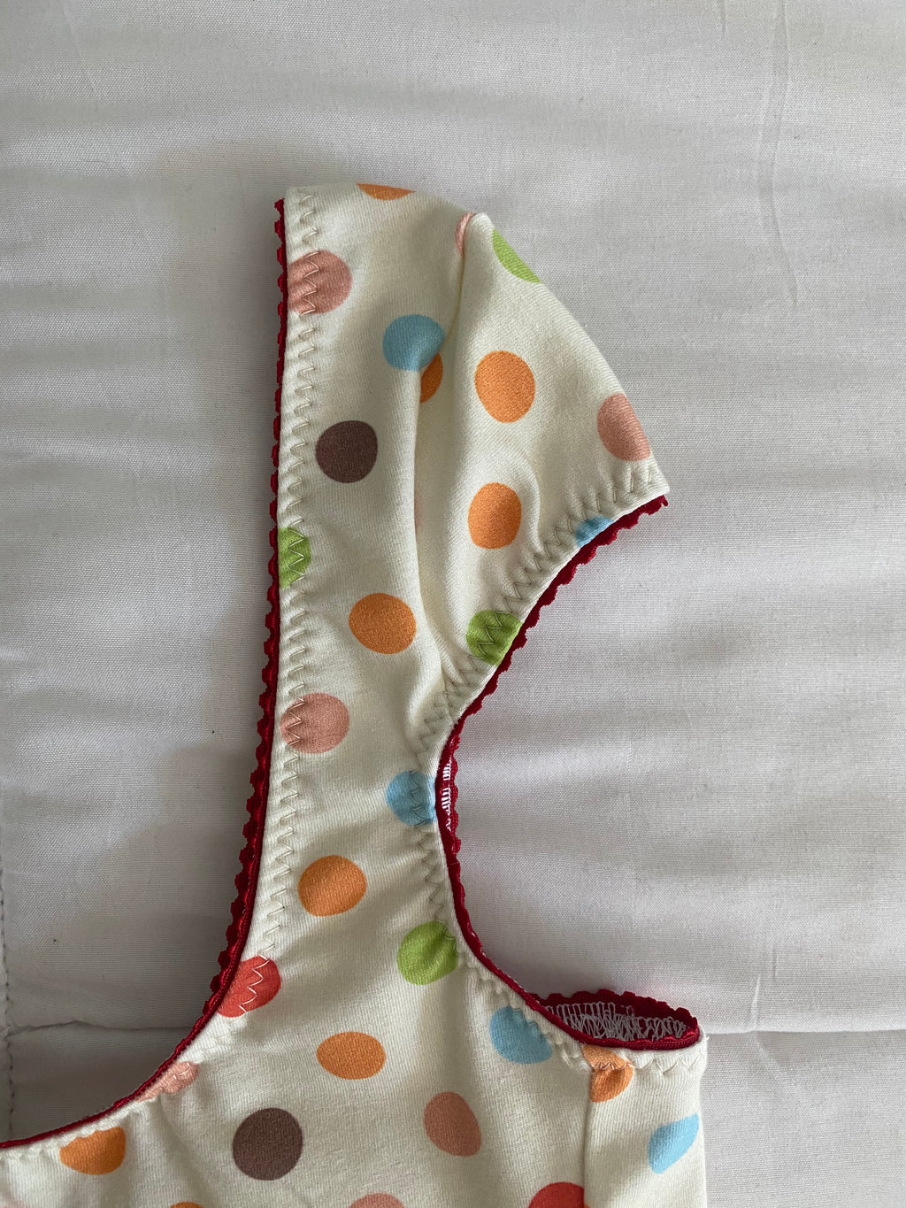 multicolored large polka dot top