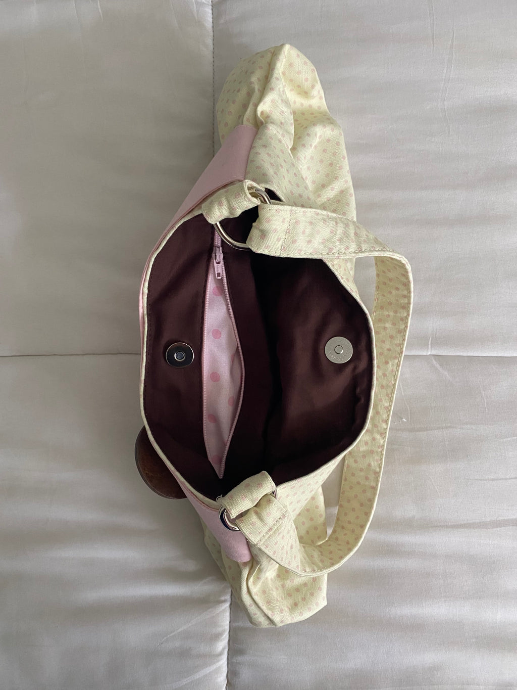cream & pink polka dot purse with button