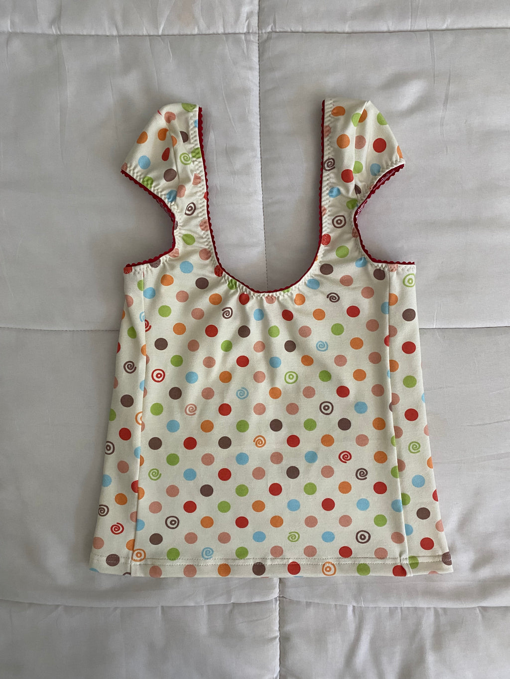 multicolored large polka dot & swirl top