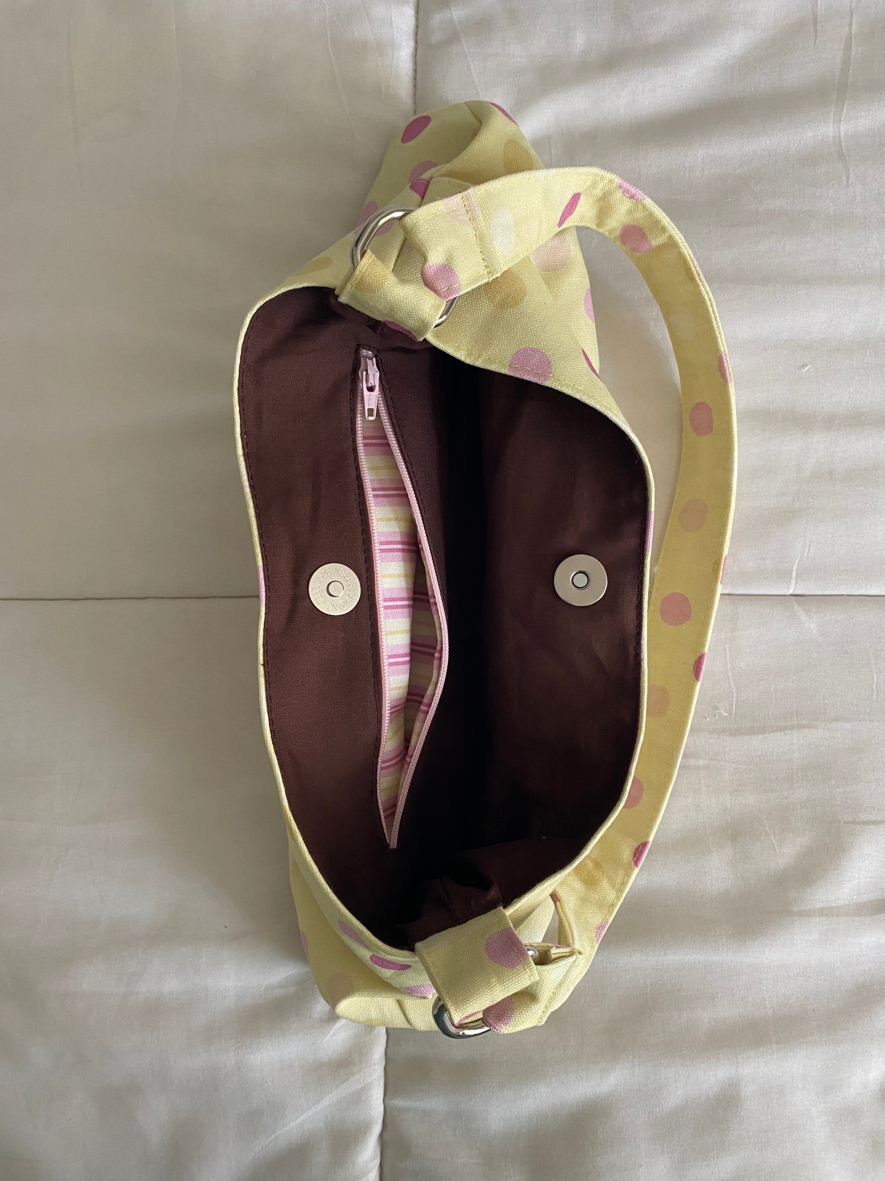 large polka dot purse in yellow
