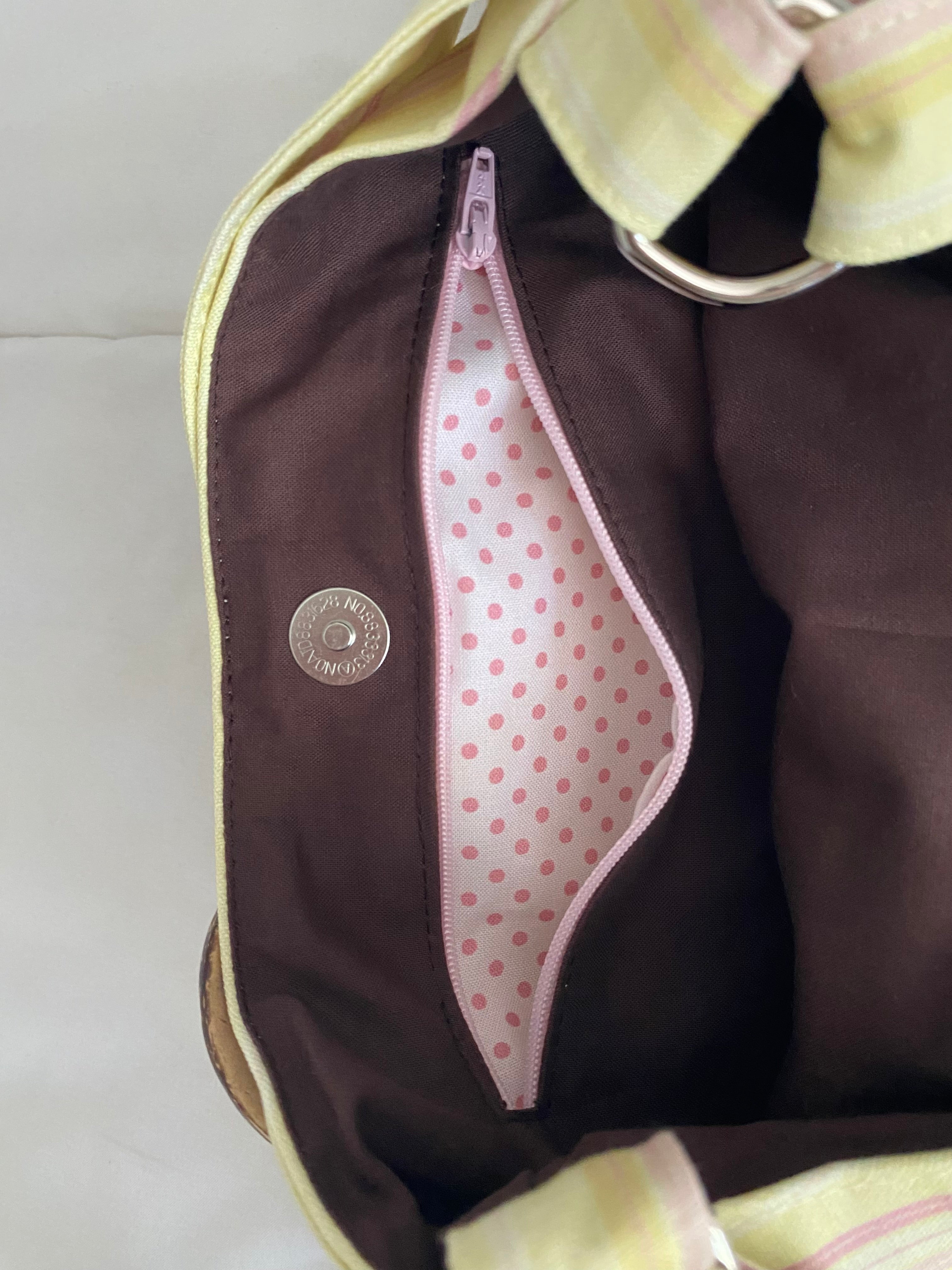yellow & pink striped purse with buckle