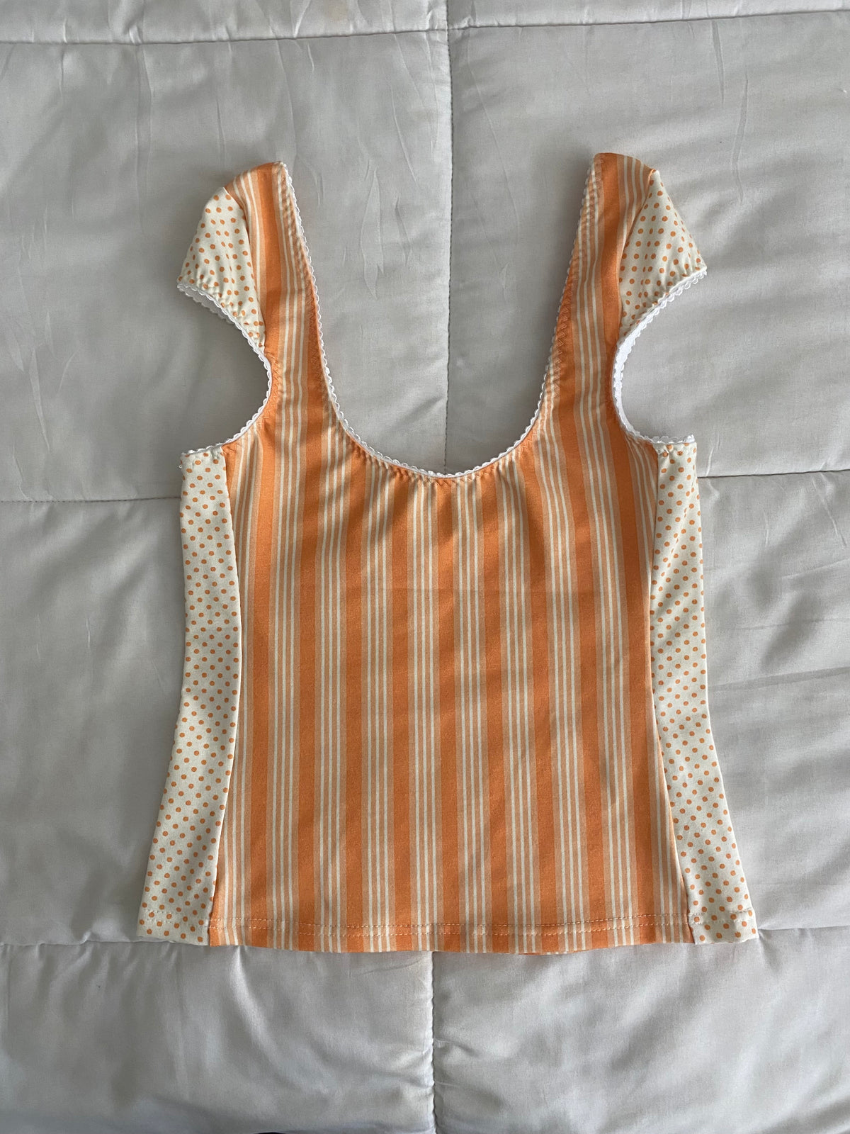 orange striped/polka dot top