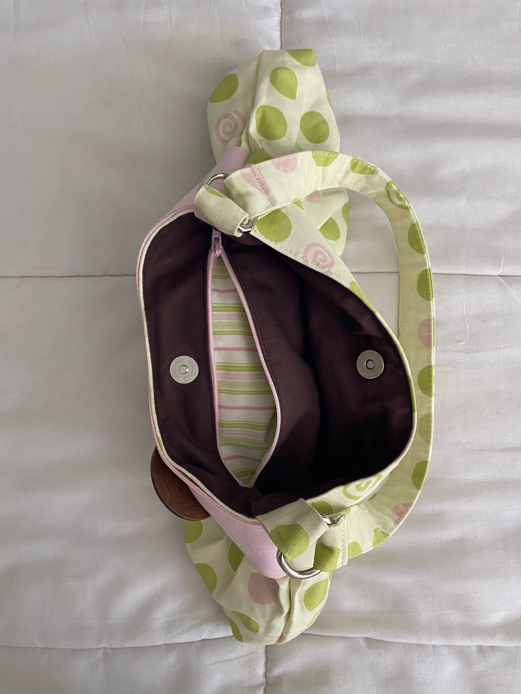 pink & green dotted/swirl purse with button