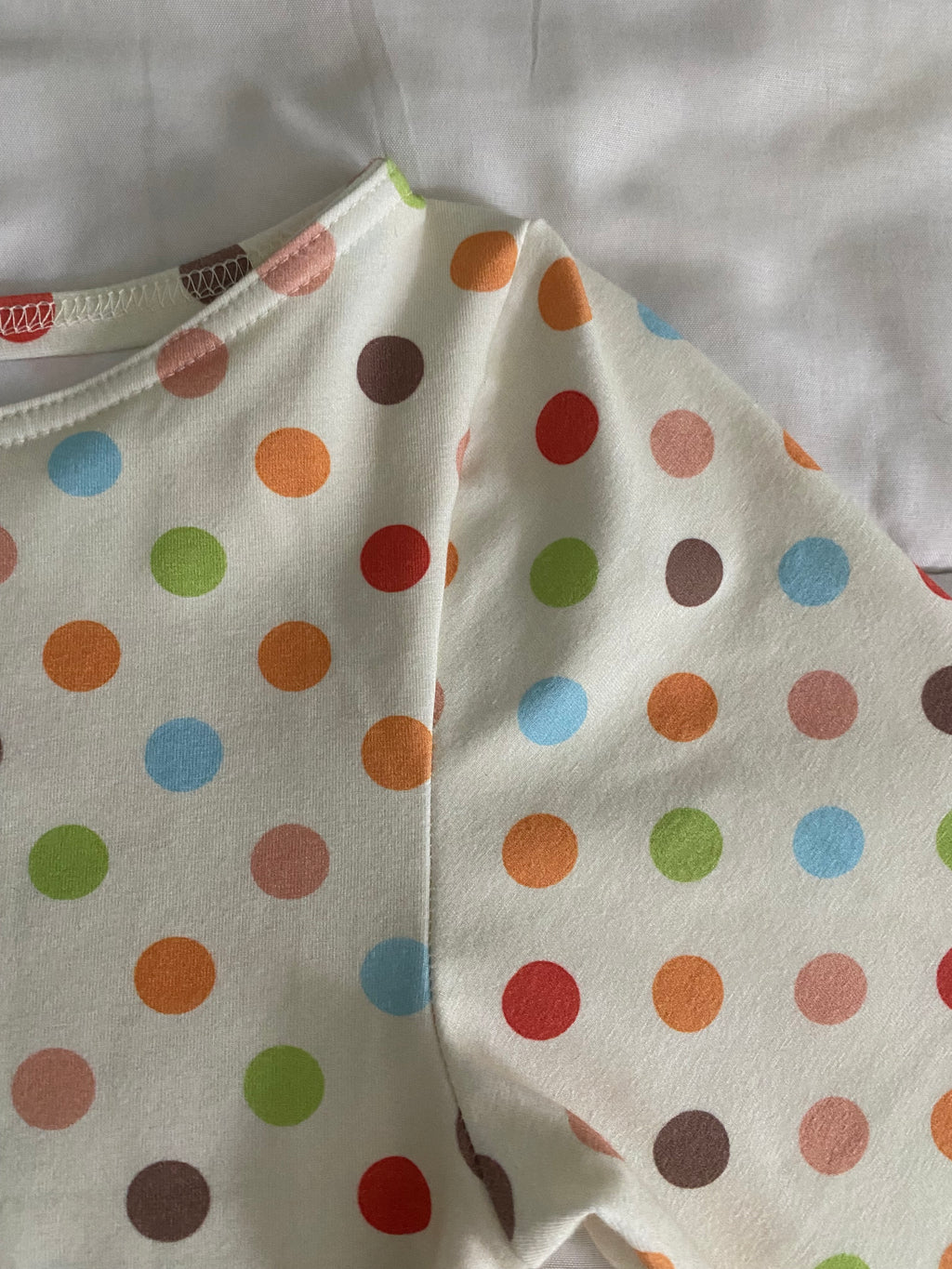 multicolored large polka dot long sleeve top