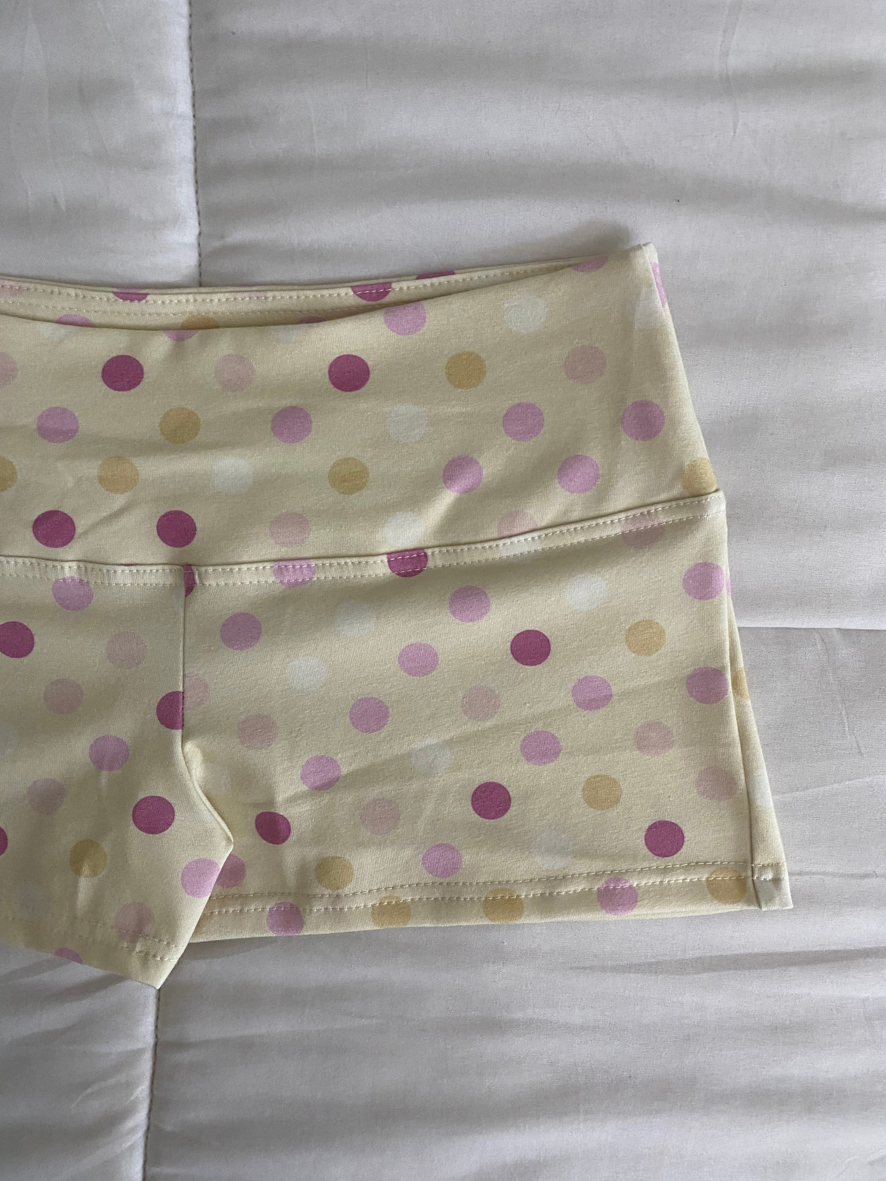 large polka dot shorts in yellow