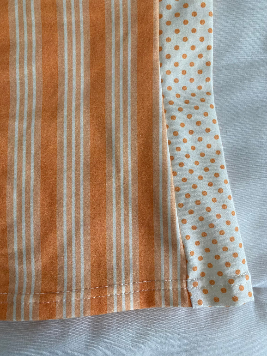 orange striped/polka dot top