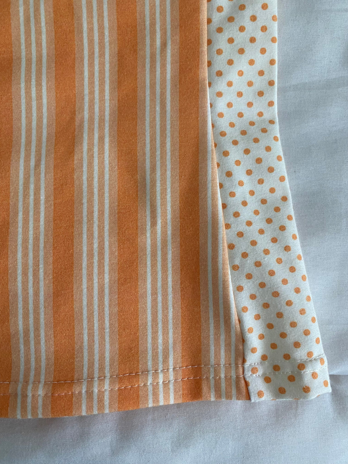 orange striped/polka dot top