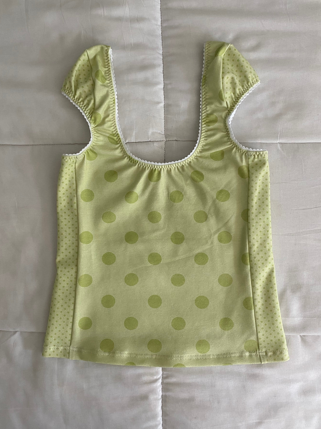 green polka dot top