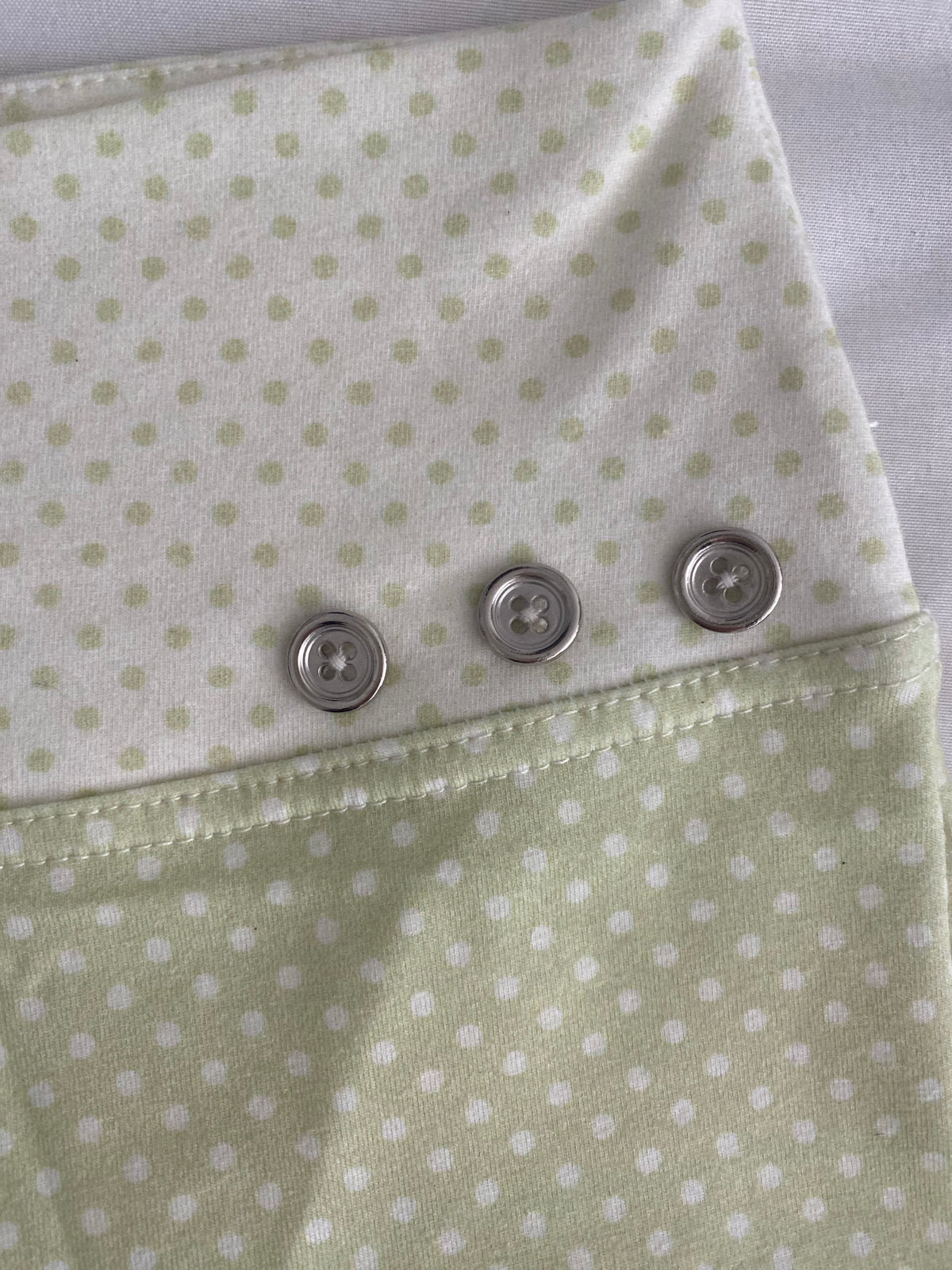 green & cream silver button shorts