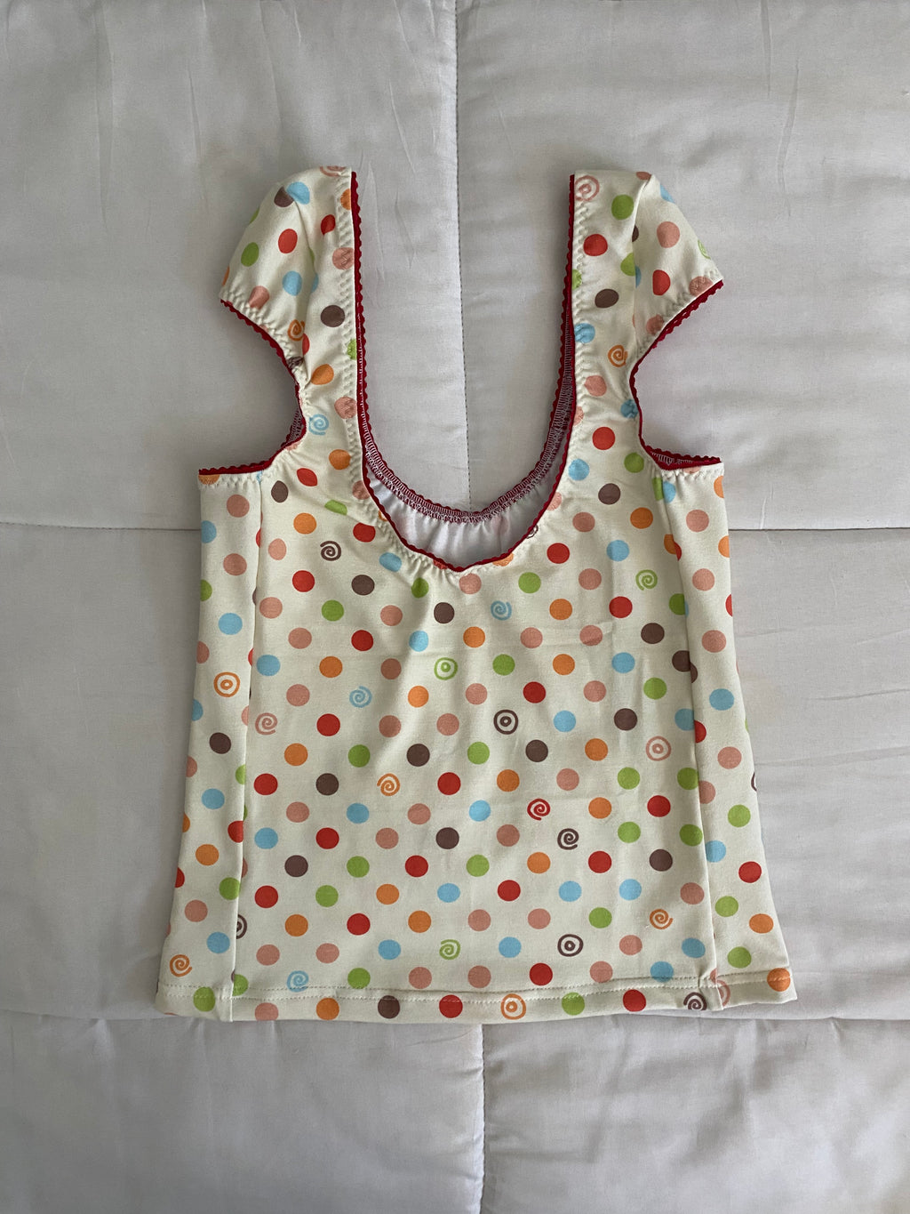 multicolored large polka dot & swirl top