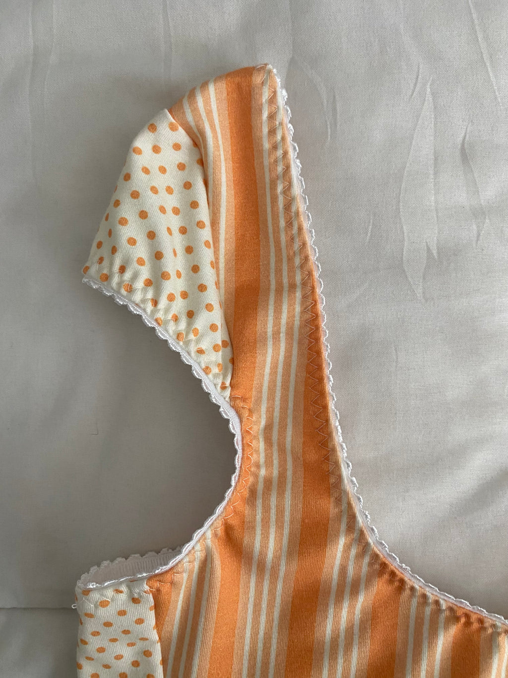 orange striped/polka dot top