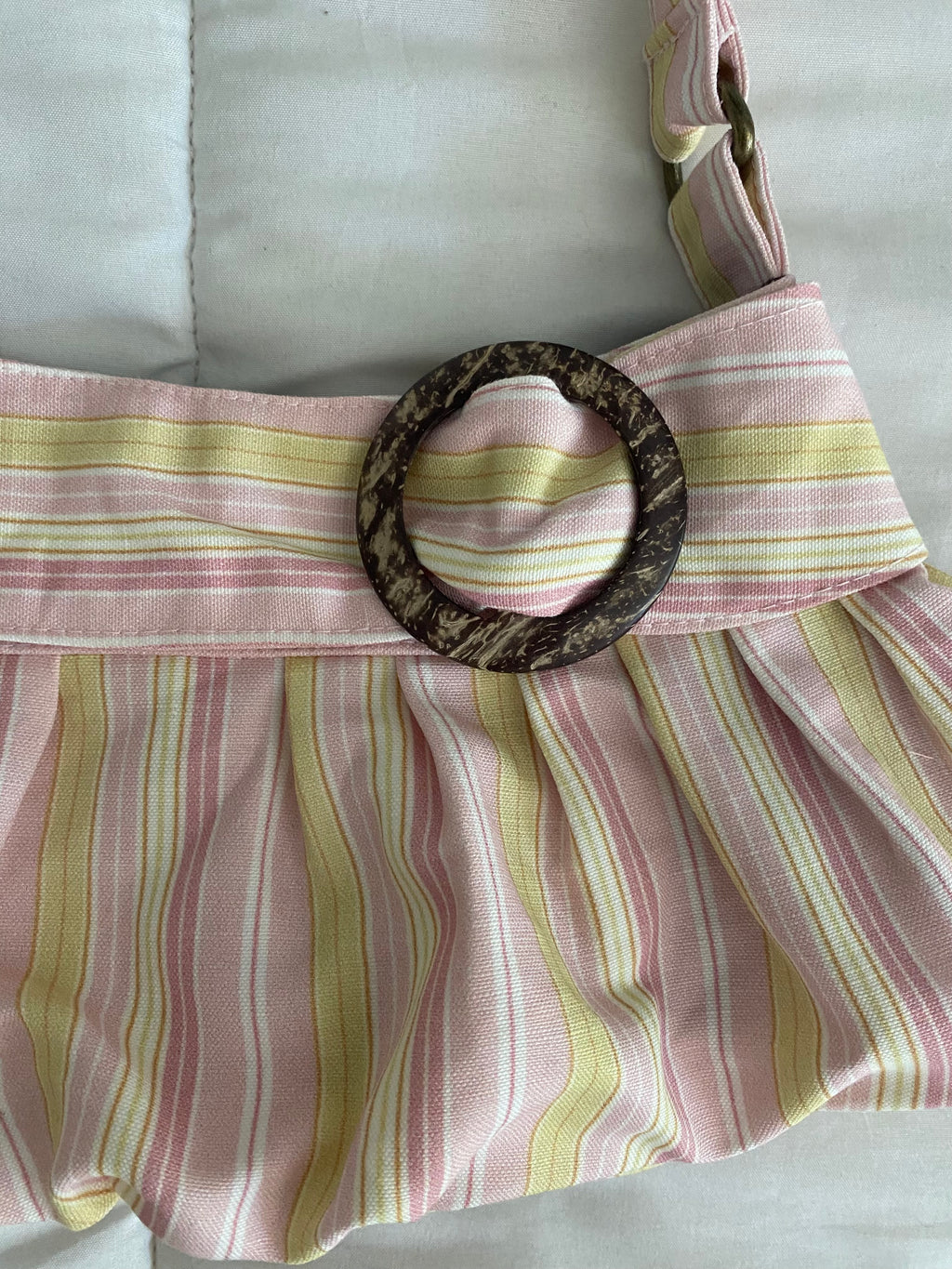 pink & yellow striped purse with buckle