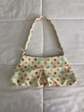 large polka dot multicolored purse