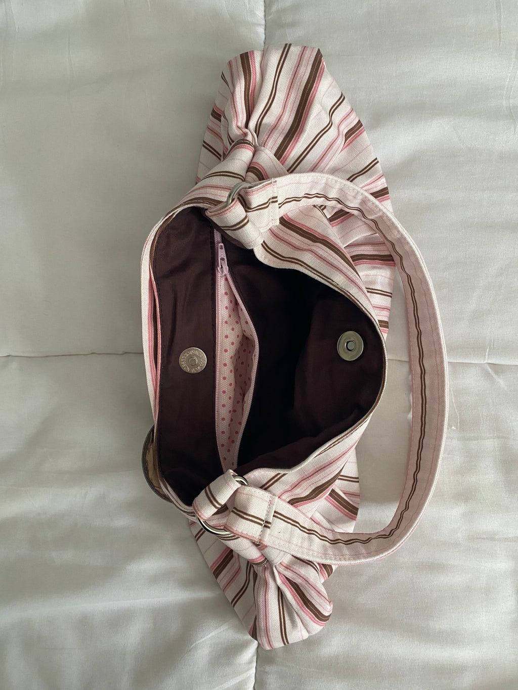 brown & pink striped purse with buckle