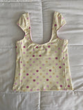 large polka dot top in yellow
