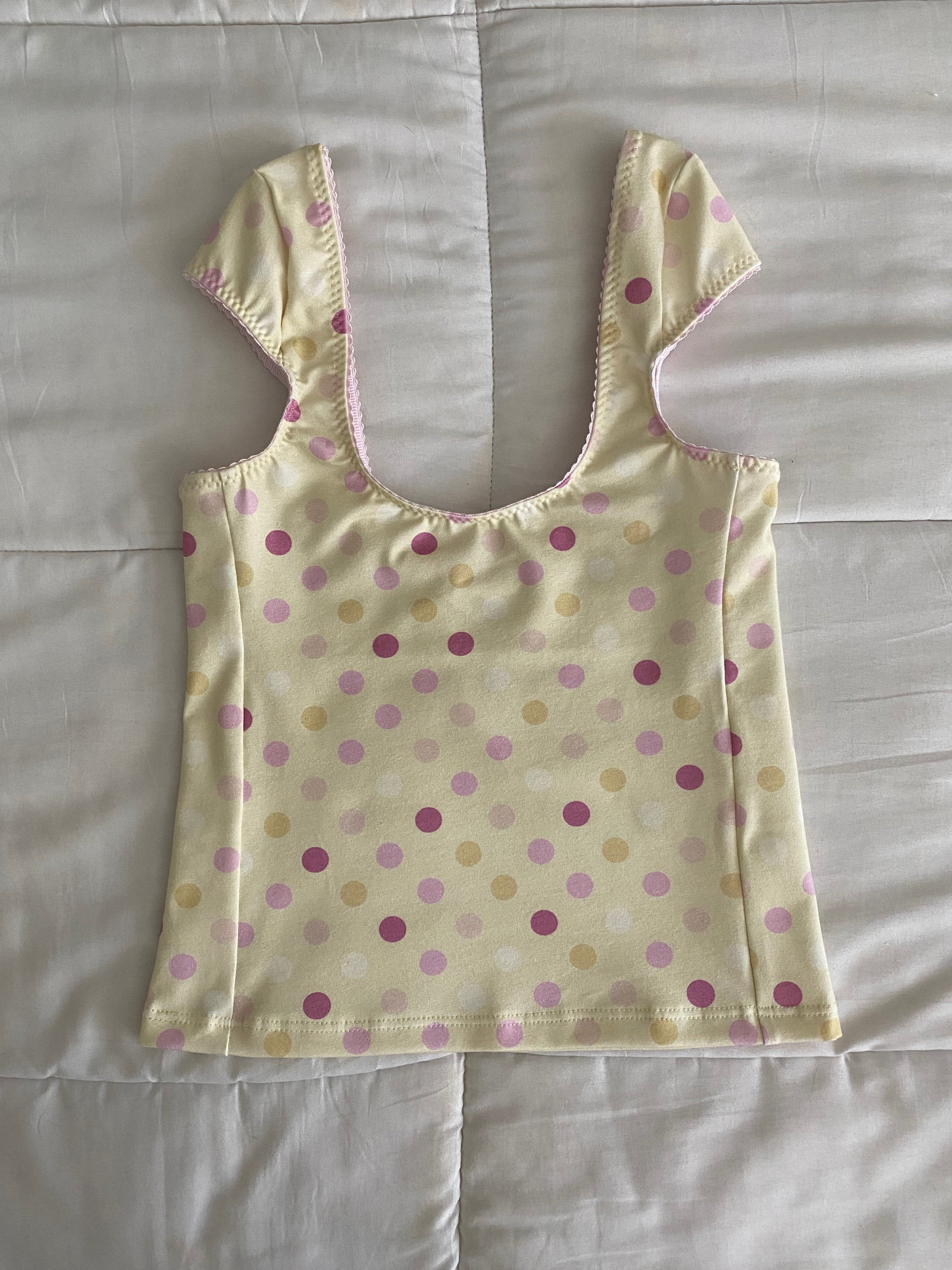 large polka dot top in yellow