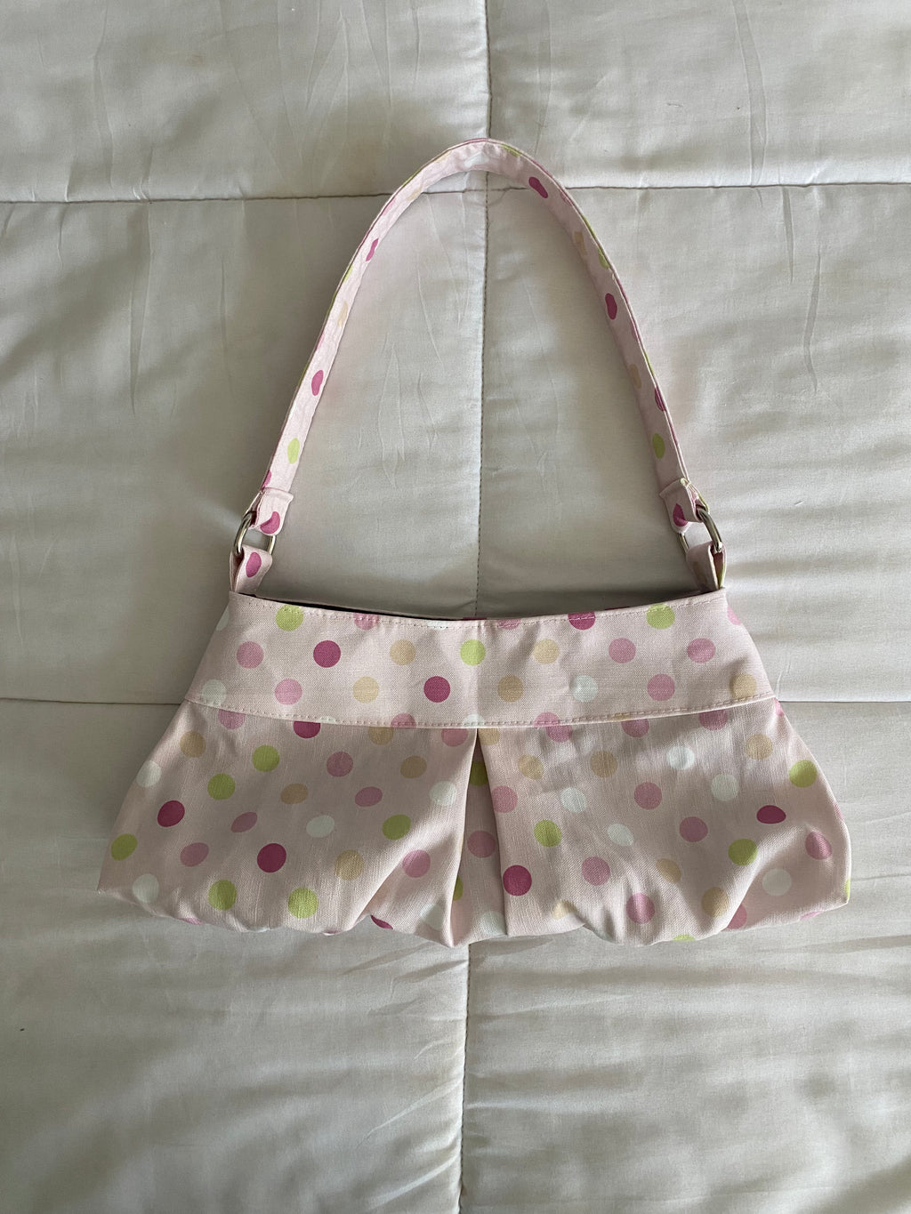 large polka dot purse in pink