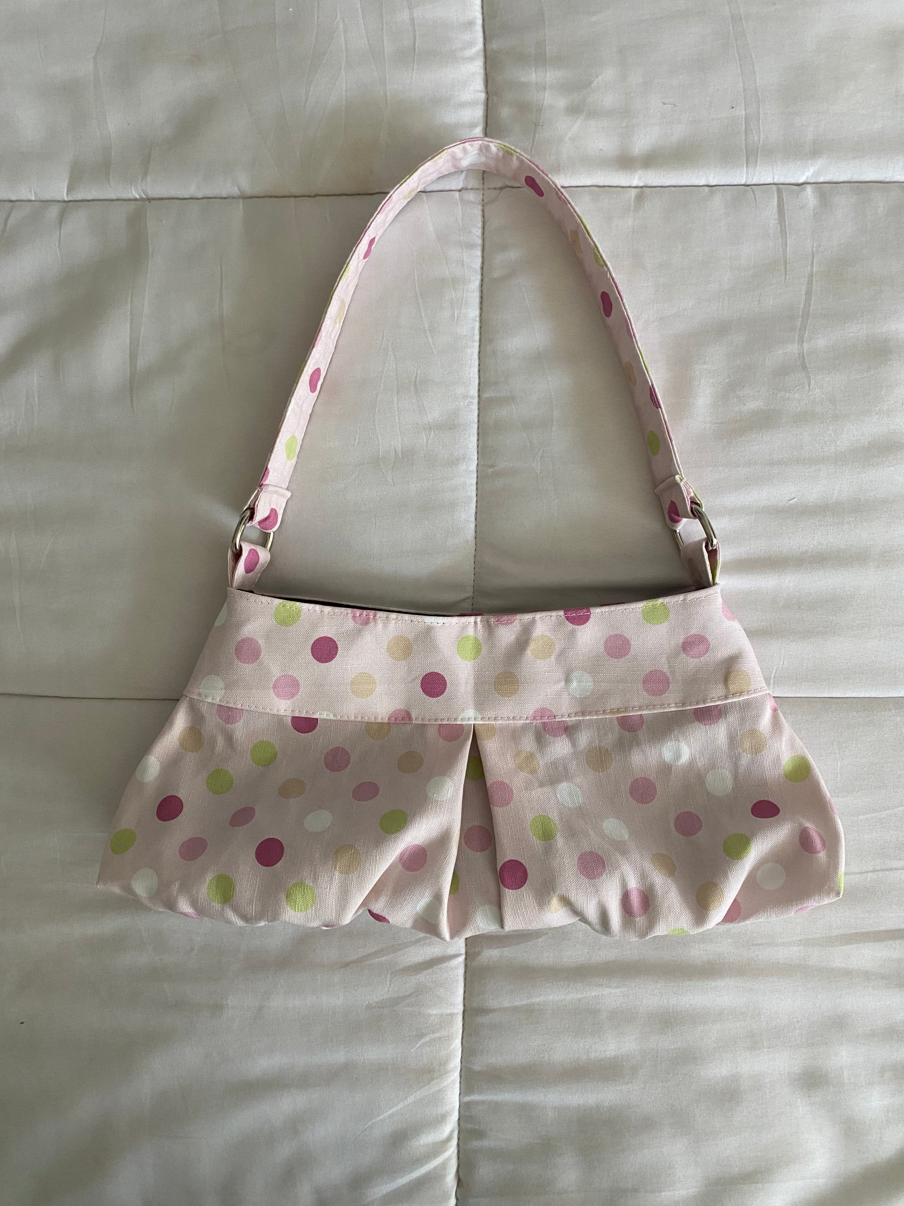 large polka dot purse in pink