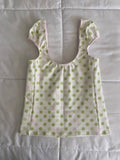 green & pink dotted/swirl top