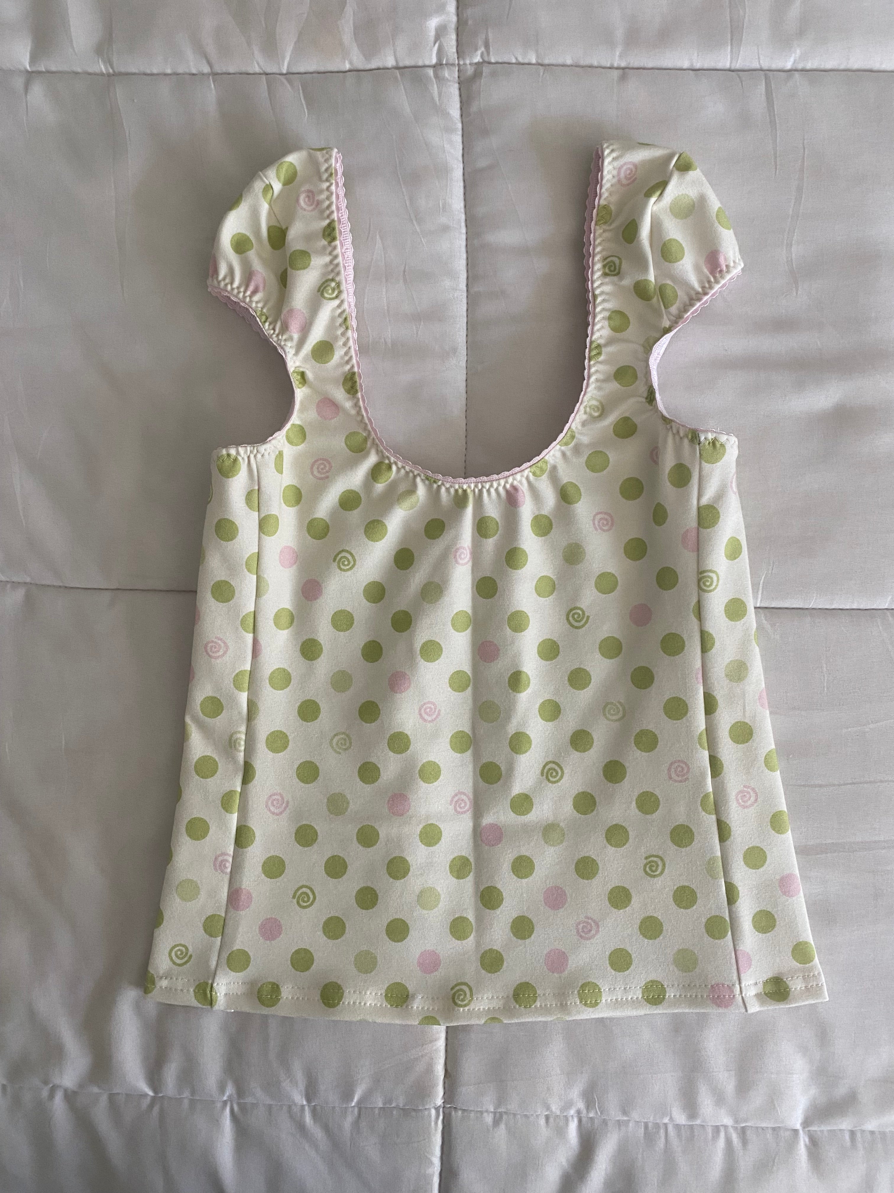 green & pink dotted/swirl top