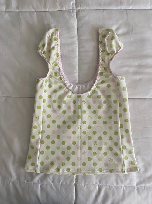 green & pink dotted/swirl top