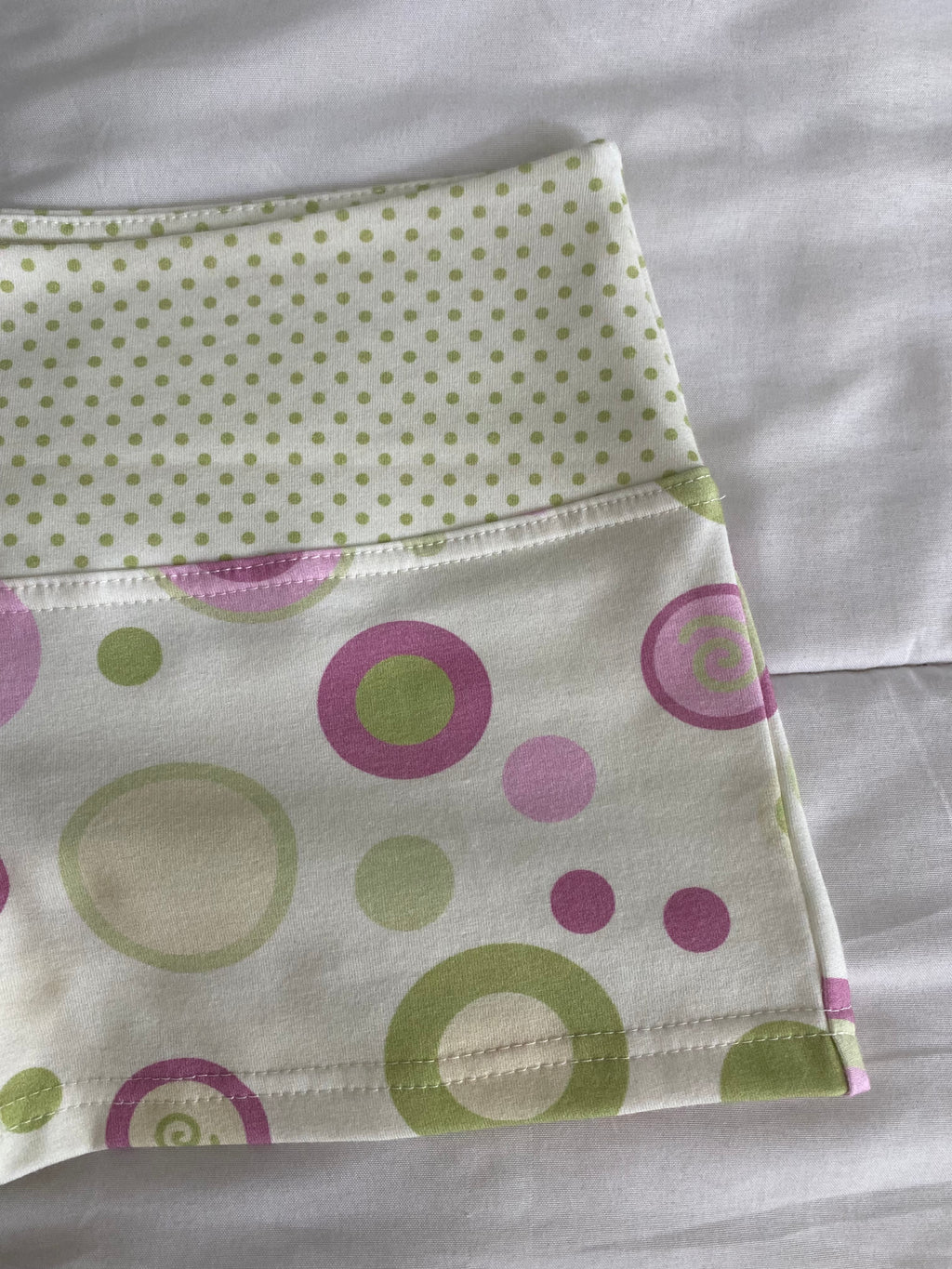 green & pink swirl shorts
