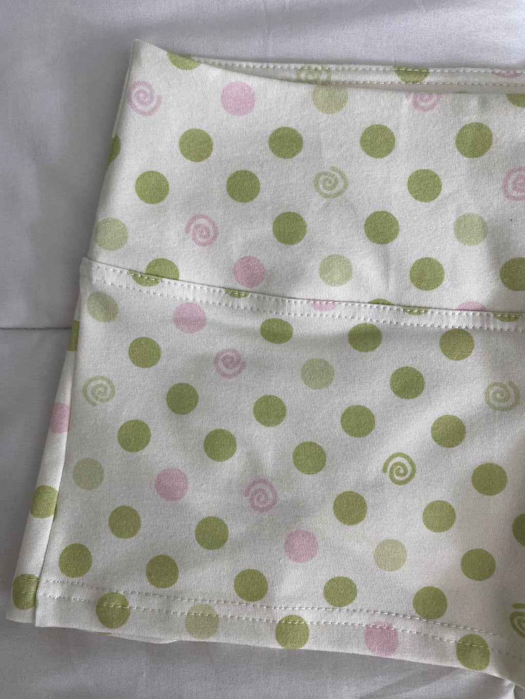 green & pink dotted/swirl shorts