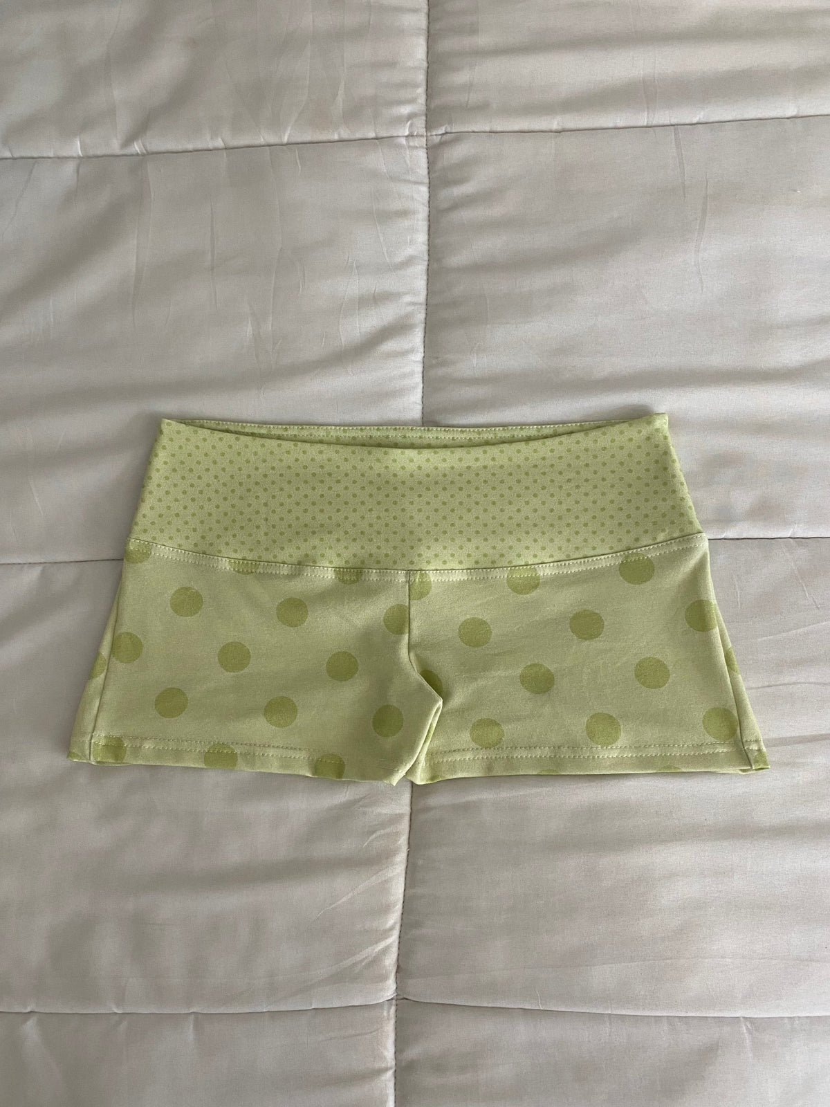 green polka dot shorts