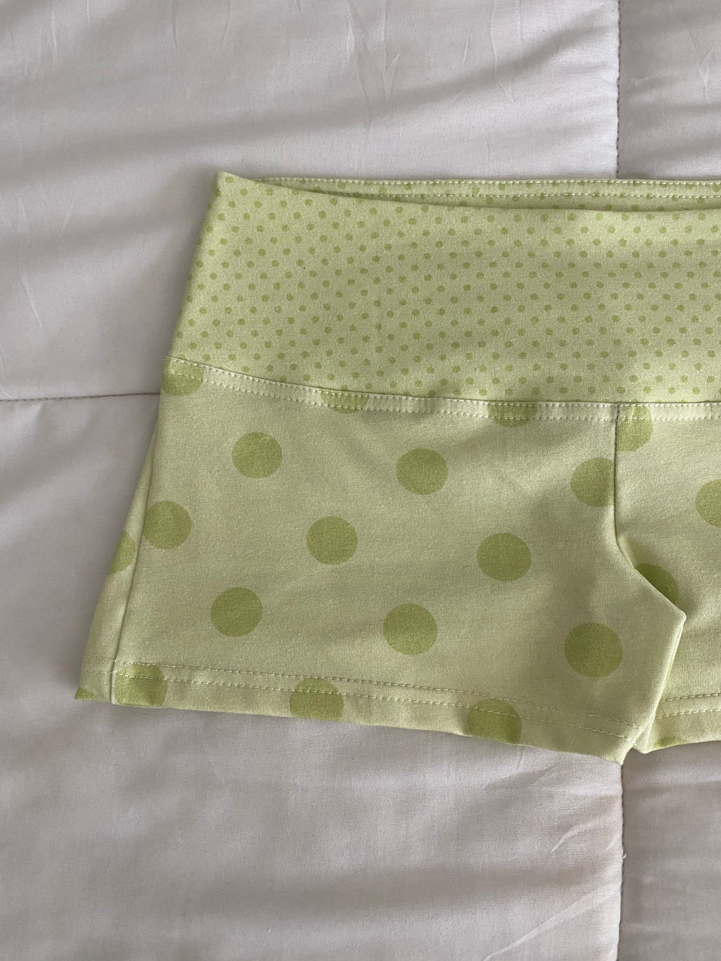 green polka dot shorts