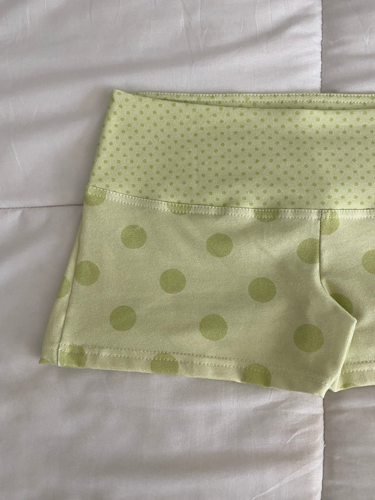 green polka dot shorts