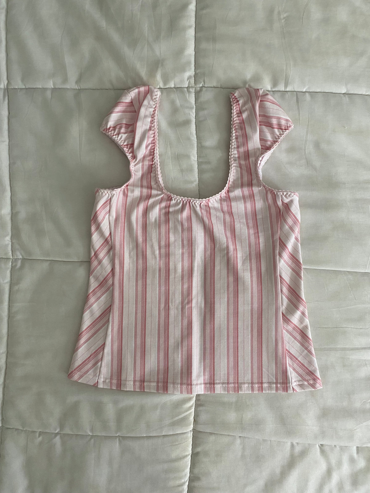 pink & white striped top with pink trim